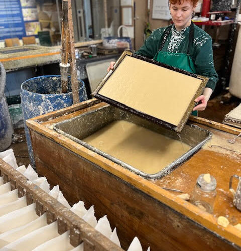 Zoe making a sheet of Cox Half Imperial Heritage paper.